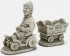Garden Gnome in car with trailer