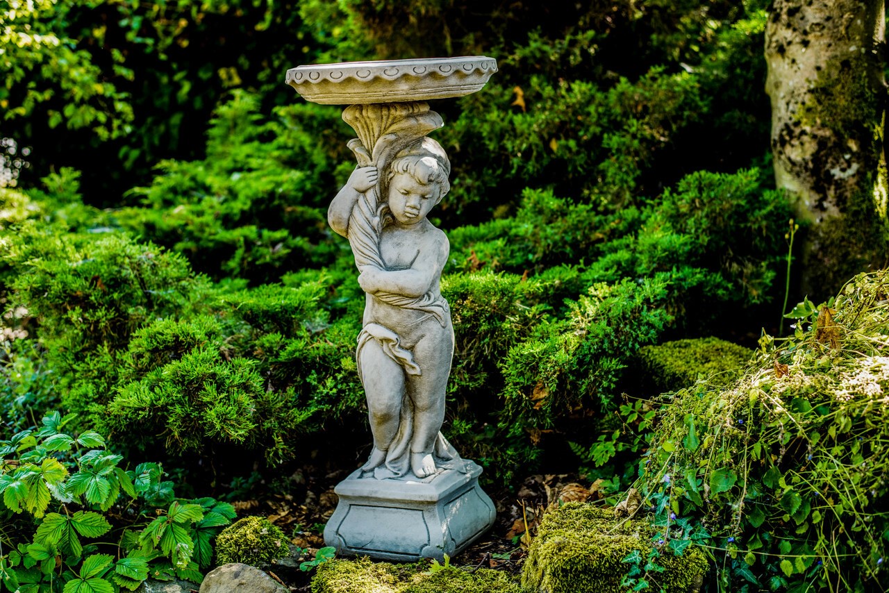 Gothic style Roman boy birdbath