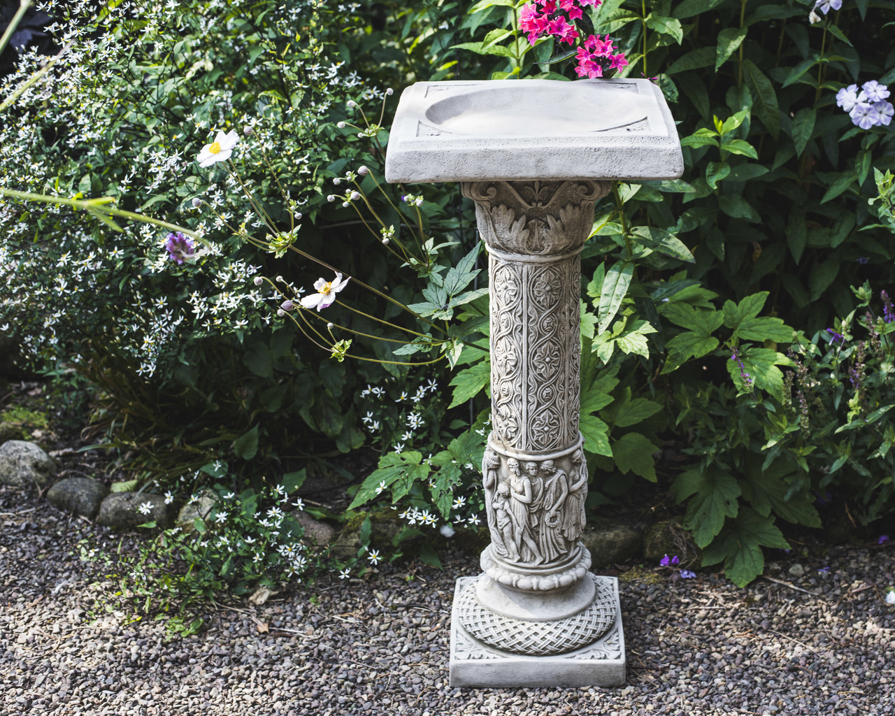 Roman style antique birdbath