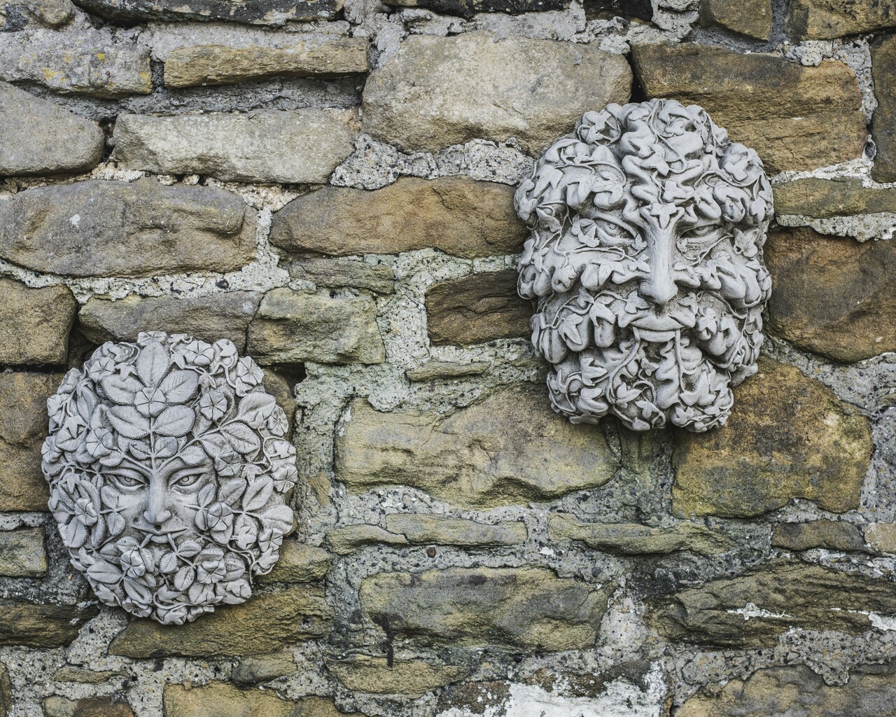 Stone cast wall plaques green man green woman face